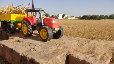 Mahindra Tractor Stuck in mud and pulling by john deer tractor Double E, Excavator