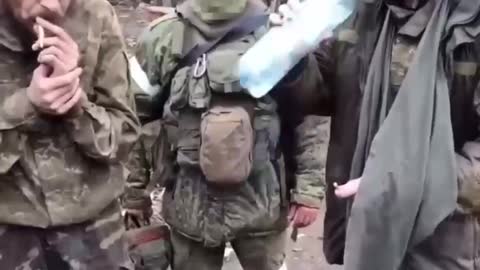 Ukrainian soldiers surrendering to Russian marines in Pavlovka.