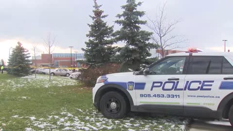 18-year-old student injured in school parking lot shooting