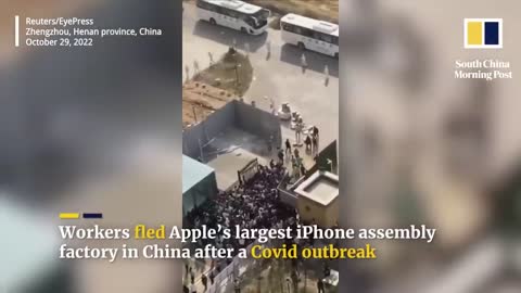 Chinese workers flee world’s largest iPhone factory after Covid outbreak