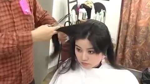 Beautiful woman haircut and headshaved