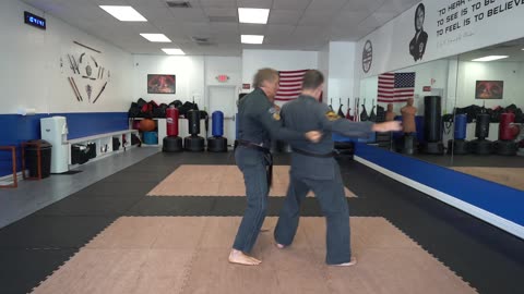 An example of the American Kenpo technique Twirling Hammers