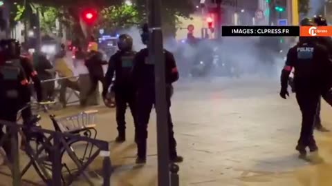 BREAKING: French police start using tear gas on protestors in Paris, France.