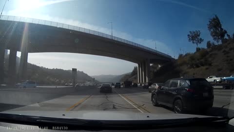 Minolta MNCD53 dashcam on-ramp 405S to LA