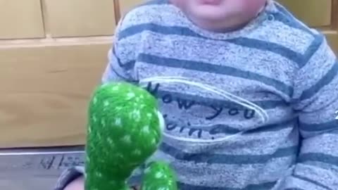 Cute baby playing funny video