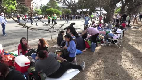 BTS fans camp out to see superstar Jin perform with Coldplay | AFP