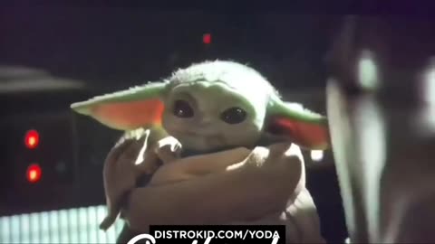 Baby Yoda playing music