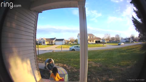 Father-Daughter Moment Caught on Doorbell Cam