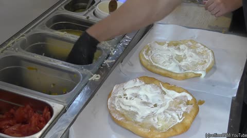 Street Food in Gdansk, Poland. Cooking Salty and Sweet Langos