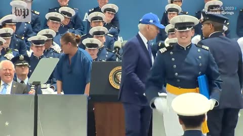 Biden falls at Air Force Academy graduation ceremony