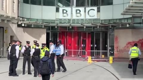 London now Palestine Action spray the BBC in blood red paint.