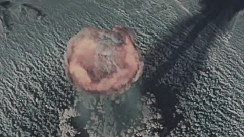 Aerial view of an atomic bomb explosion at Nevada Desert