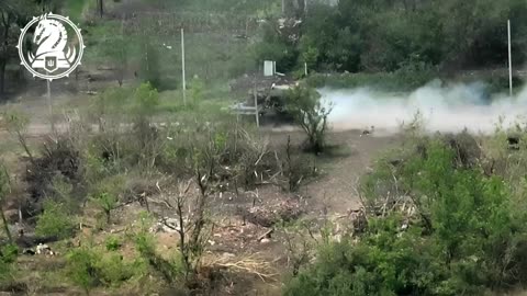 Ukrainian Bradley Firing on Russian Assault Group from Point Blank Range