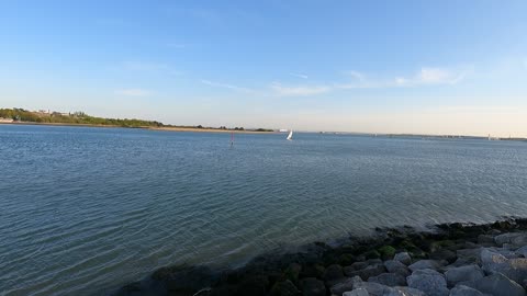 Small boat on calm waters.