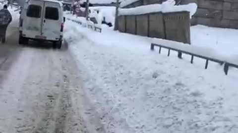 The moment of the avalanche, covered people, Elbrus, Dombay