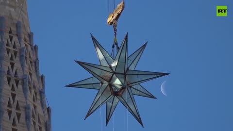 The giant STAR LIFTED atop Sagrada Familia