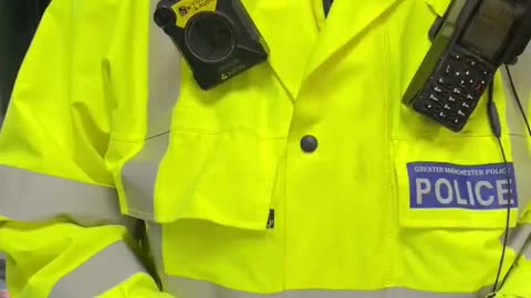 Police trying to arrest a man in Manchester for not wearing a face mask