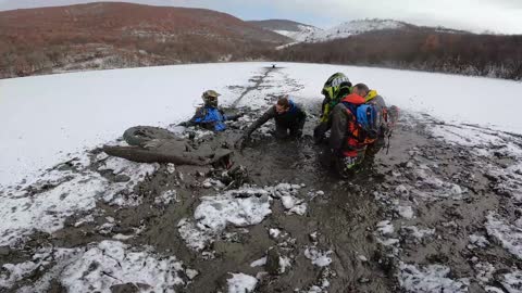 Motor Bike Riders Slip into Large Clay Pond