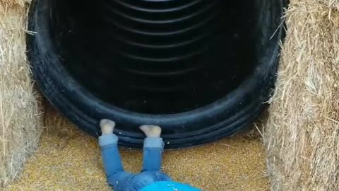 Kid faceplants down the slide