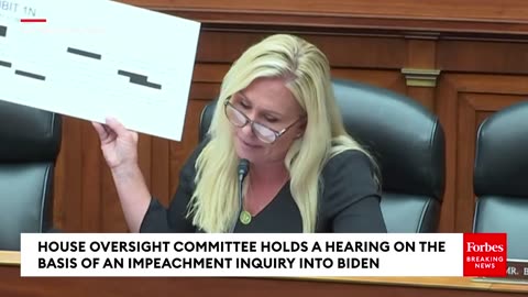 At today's House Oversight Committee hearing, Rep. Marjorie Taylor Greene (R-GA) clashed with Democrats over her visual aids to attack Hunter Biden.