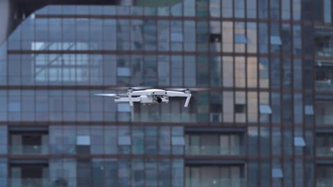 Drone in the sky at a city