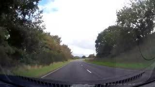 Oncoming Truck's Cargo Smacks Windscreen