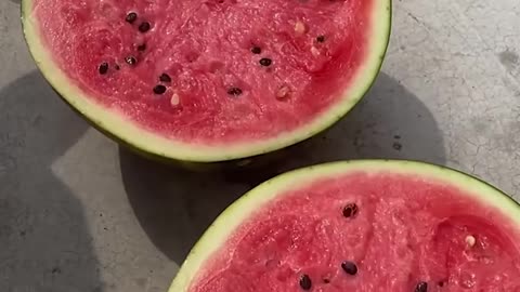 Cutting a watermelon in half!