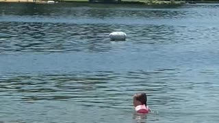 Couple Completely Unconcerned with Other Beach Goers