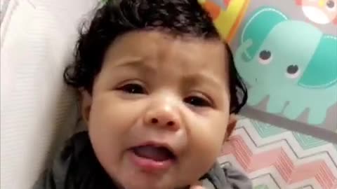 Beautiful 4 month old baby girl tries lemon