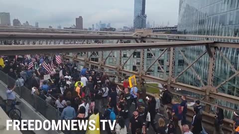 NOW - Large protest against vaccine mandates in New York City.