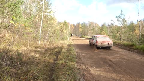 Rally Car Nearly Wrecks into Camera Man