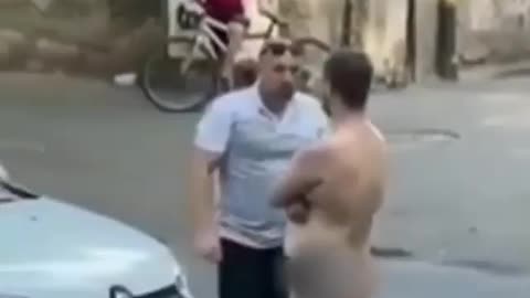 Naked Man Blocking The Road Gets KOd