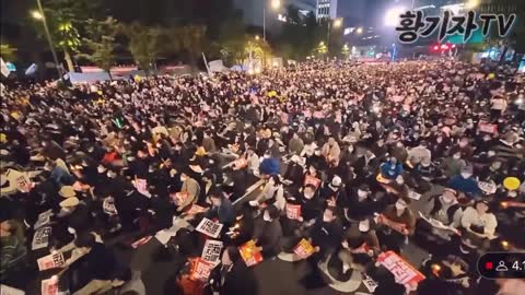 Democratic People's Republic of Korea, demonstrate in support of Yoon Seok-yeol's resignation.