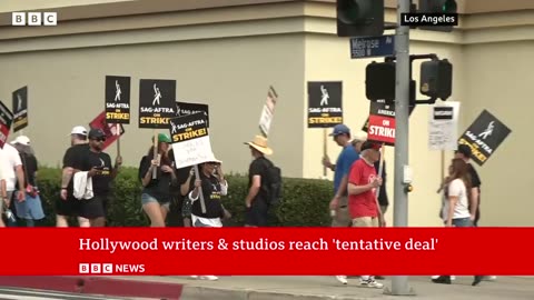 Hollywood writers in deal to end US studio strike - BBC News