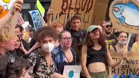 Generation Z climate activists scream at each other and jump to demand an end to Climate Change