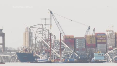 Floating crane arrives at wreckage of Baltimore's collapsed bridge