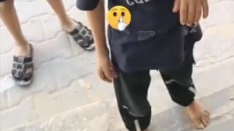 Palestinian Children Bullying a Young Israeli Boy Who Was Taken Back inti Gaza