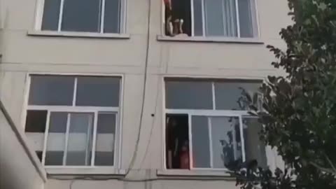 Firemen kicking suicidal people away from the edge