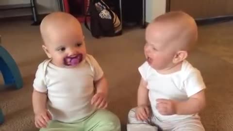 Twin Baby Girls Fight over pacifier