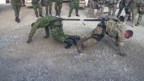 One on one soldier Tug of War, Canada vs USA