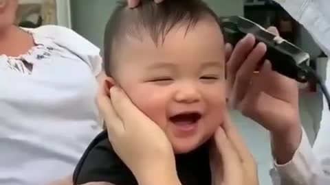 The Boy is so very adorable while getting a haircut