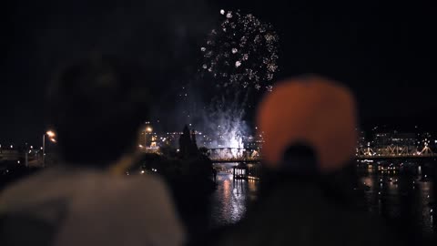 A different kind of fireworks explode in the quiet night sky