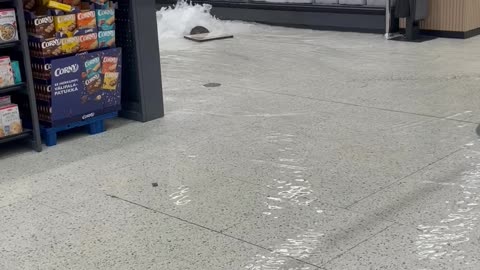 Rainwater Floods Into Grocery Store Through Drainpipe