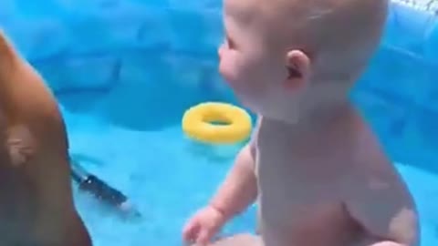 Cute Baby and Dog Both Bathing in Water Tub