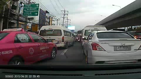 Child Falls from Car into Traffic