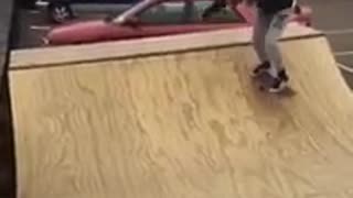 Girl orange hat skate ramp drop fail