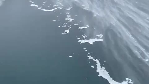 Wind Pushes Ice Fisherman Across Frozen Lake