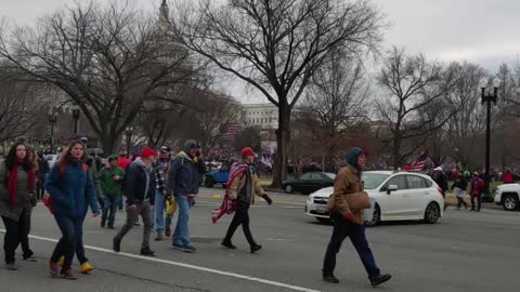 Patriots unfurled a huge American Flag at the Capitol