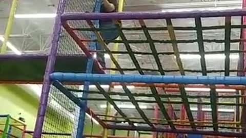 Grown Ups Playing in the Jungle Gym