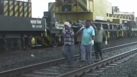 Aftermath of double train derailment in India